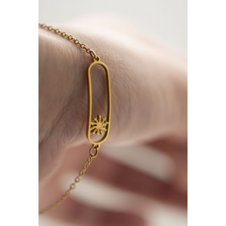 PULSERA EGUZKILORE ACERO DORADO